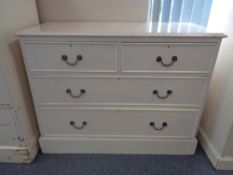 A Victorian pine four drawer chest with brass drop handles