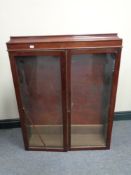 An Edwardian bookcase top