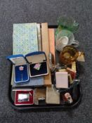 A tray of commemorative glass ware, diplomat lighter, rosary beads,