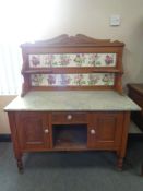 A late Victorian satin walnut tiled back washstand