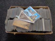 A box of twentieth century black and white & colour postcards