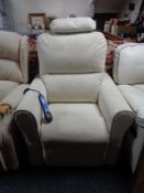 A Niagara electric reclining armchair in cream fabric