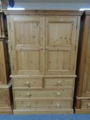 A pine double door tall boy