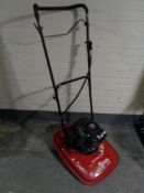 An Allen 446 hover trim petrol mower