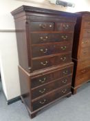 A George III mahogany chest on chest on bracket feet