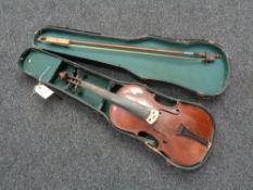 An early 20th century violin and bow in coffin case CONDITION REPORT: Back 13