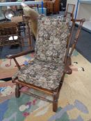 A 20th century fire side armchair