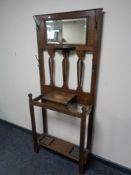 An Edwardian oak mirrored hall stand
