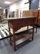 A contemporary console table fitted with three drawers