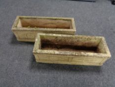 Two composite plant troughs