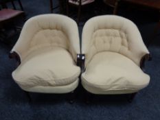 A pair of Victorian style button back tub chairs