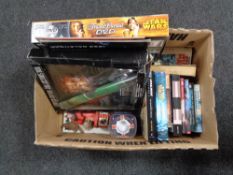 A box of Star Wars items to include - Limited edition Phantom Menace collector's box, books,