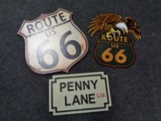 A cast iron Penny Lane street sign and two metal Route '66 signs