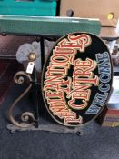 A painted cast metal sign - Pendle Antiques centre