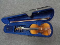 A twentieth century Chinese violin with bow in case