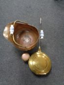 An antique copper and brass porcelain handled coal bucket,