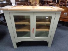 A contemporary double door dresser top