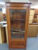 A mahogany glazed door display cabinet