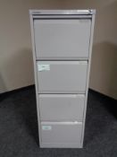 A four drawer Bisley metal filing cabinet with key