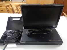 A Samsung blu ray player, with remote,