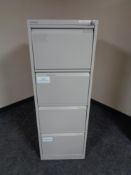 A four drawer Bisley metal filing cabinet with key