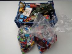 A box and crate of mixed Lego, die cast vehicles, Corgi, Matchbox,