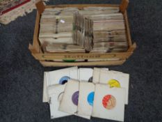 A wooden crate of 45 singles including The Rolling Stones,