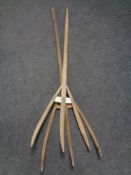 Two rustic hay forks
