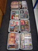 Eight boxes of large quantity of DVDs including Westerns