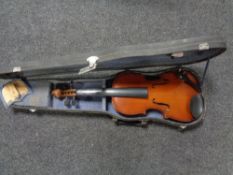 A Chinese violin in case with bow