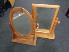 Two pine toilet mirrors