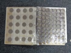 A folder of twentieth century pre decimal coins