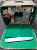 A cased 20th century Koyo electric sewing machine (continental wiring)