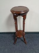 An Indonesian barley twist plant stand