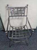 A wrought iron armchair