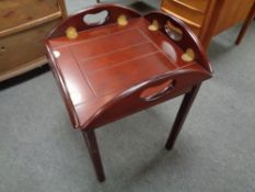 A mahogany butler's tray on stand