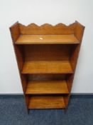 A set of narrow open shelves