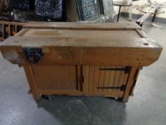 A 20th century wooden work bench fitted with a Record vice CONDITION REPORT: