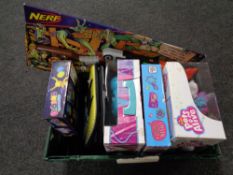 A crate of toys including Nerf gun, crystal tattoos, jewellery kit,