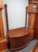 A nineteenth century mahogany bow fronted four drawer dressing chest (lacking mirror back)