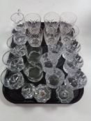 A tray of glass, crystal whisky glasses, candle holders,