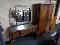 A twentieth century walnut double door wardrobe together with a walnut dressing table (2)