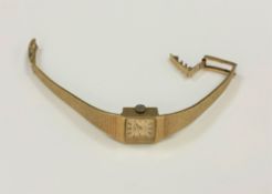 A 9ct gold lady's Rotary wrist watch on 9ct gold integral strap, 22.1g.