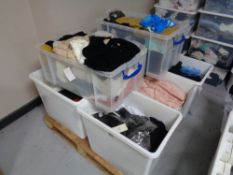 Eight plastic crates of lady's clothing