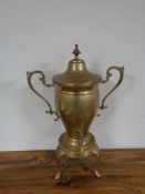 An early twentieth century brass twin handled samovar on stand