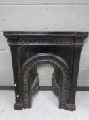 A cast iron fire insert