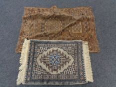 Two fringed rugs