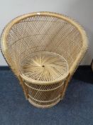 A wicker tub chair