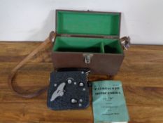 A leather cased Pathescope Motocamera type II cine camera with instruction book