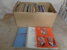 A box of sheet music